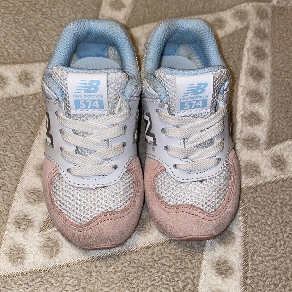New balance sneakers in light pink and blue
